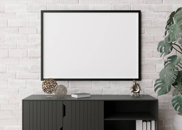 istock Empty horizontal picture frame on white brick wall in modern living room. Mock up interior in minimalist, scandinavian style. Free, copy space for picture, poster. Console, sculptures. 3D rendering. 1387128602