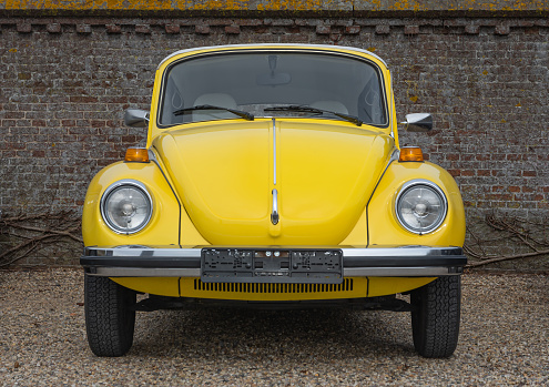 Brummen, Province Gelderland, The Netherlands, 12.03.2022, Legendary retro car Volkswagen Beetle in perfect condition isolated