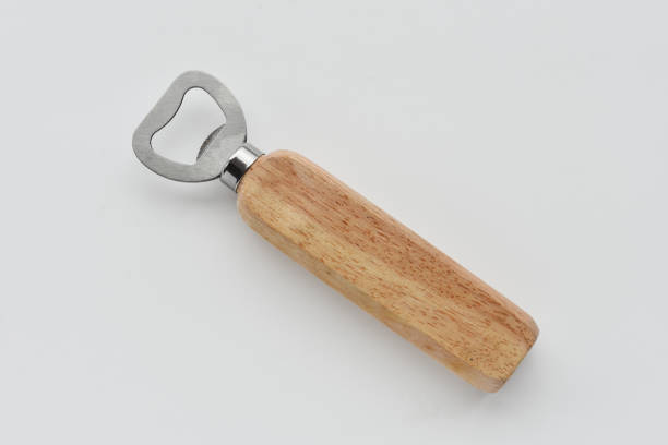 apribottiglie con manico in legno - bottle opener foto e immagini stock