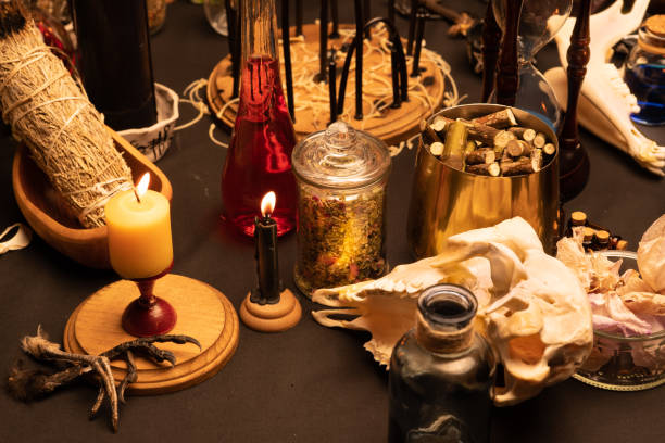 istock Witchcraft ritual ceremony, selective focus. Alchemy and esoteric symbol items for magic cult. Spiritual occultism and magic chemistry inspired by mysticism. Witch and warlock magician concept. Halloween. 1387135868