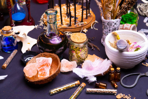 istock Witchcraft ritual ceremony, selective focus. Alchemy and esoteric symbol items for magic cult. Spiritual occultism and magic chemistry inspired by mysticism. Witch and warlock magician concept. Halloween. 1387135871