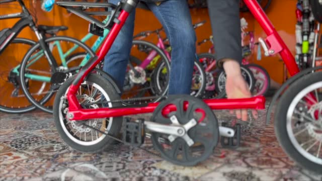 Red folding bike 4k stock footage