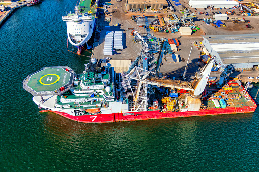 Norfolk, VA, USA - June 20, 2022: Aerial drone photo of military ships at Port of Virginia