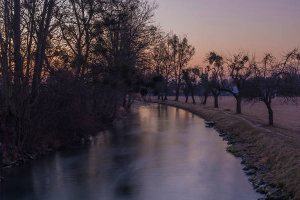 Morava river in LItovel town with sunrise colors on sky in winter morning