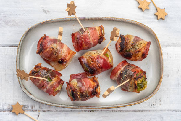 istock Green Brussels sprouts wrapped in smoked bacon 1387141687