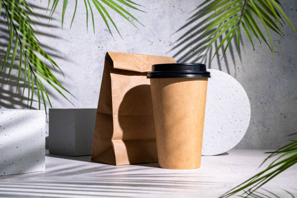 istock Take away paper coffee cup with lunch bag 1387141725