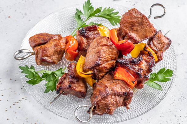 istock Grilled pork kebab with red and yellow pepper 1387141833