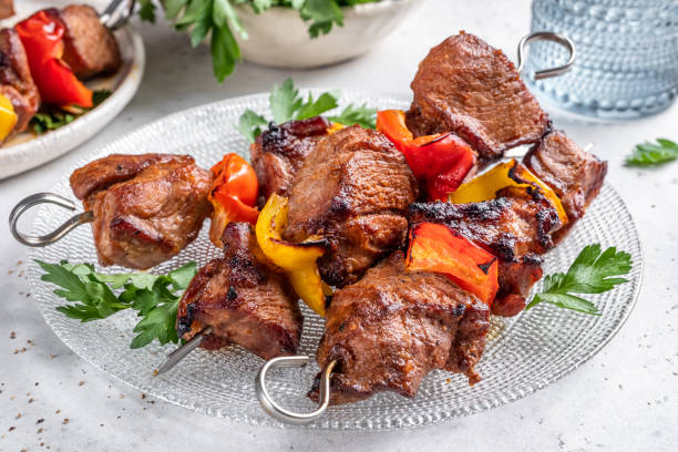 istock Grilled pork kebab with red and yellow pepper 1387141839
