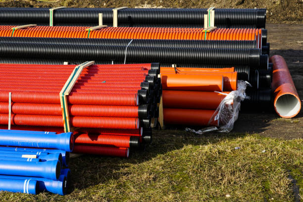 istock underground communication plastic pipes of different colors and diameters 1387143217