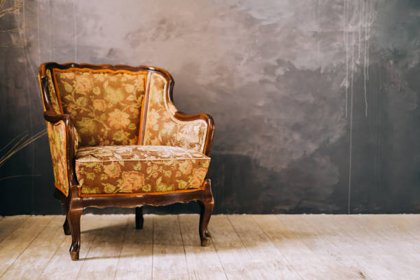 istock Big vintage armchair on black background. 1387143233