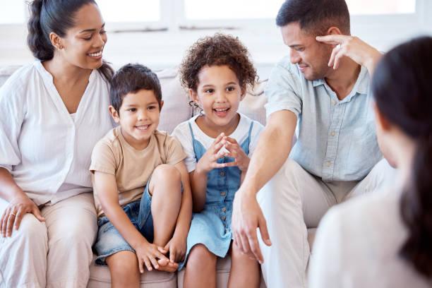 Shot of a family meeting with a therapist All families can benefit from therapy psychotherapy stock pictures, royalty-free photos & images