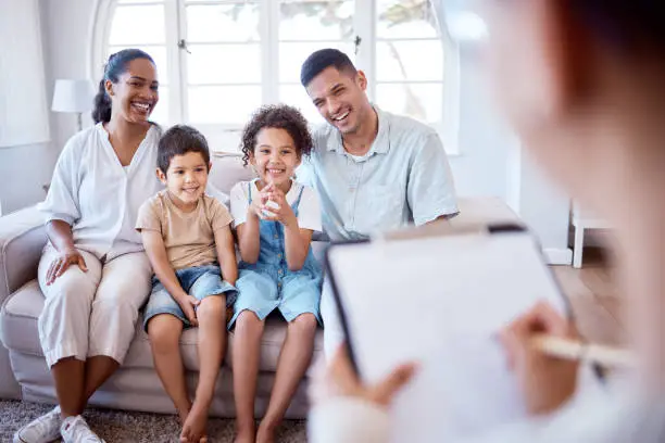 Photo of Shot of a family meeting with a therapist