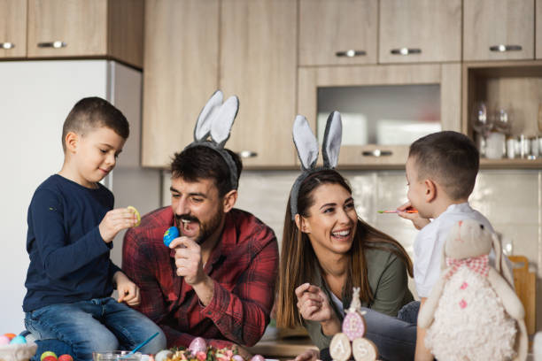 istock Cheerful family celebrating Easter at home 1387148165