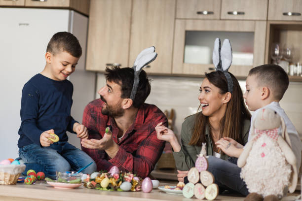 istock Cheerful family celebrating Easter at home 1387148219
