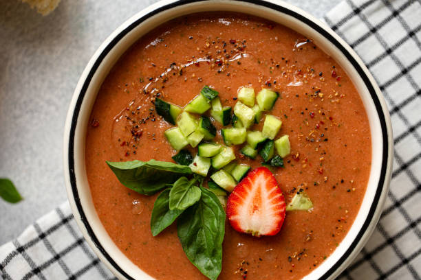 istock Gazpacho andaluz cold tomato soup in bowl. Top view. 1387149422