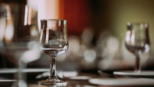 istock Close-up of an empty wine glass on the dining table. 1387150091