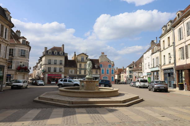 Avallon - Fountain The fountain located in Place du General de Gaulle, city of Avallon, department of Yonne, France avallon stock pictures, royalty-free photos & images