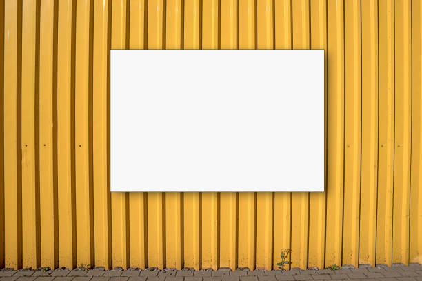 istock Empty white horizontal advertise banner fixed on yellow metal fence 1387151130