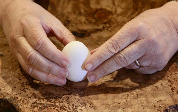 istock Trying To Balance An Egg On End 1387152353