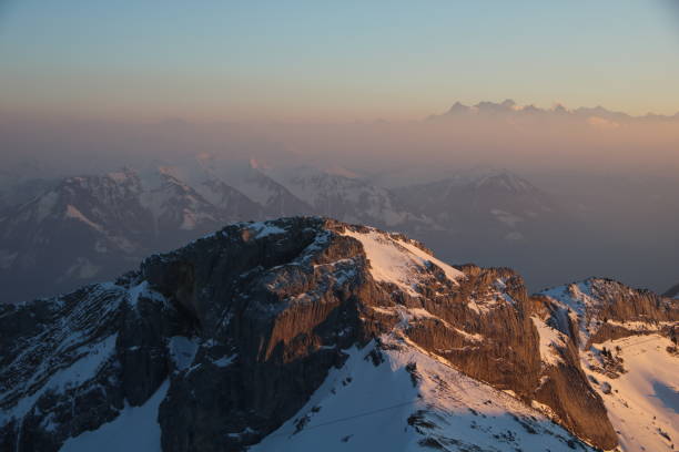 Mount Matthorn and other mountains just before sunset. View from Mount Pilatus. stock photo