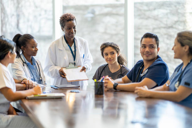 istock Female Doctor Teaching Nursing Students 1387152890