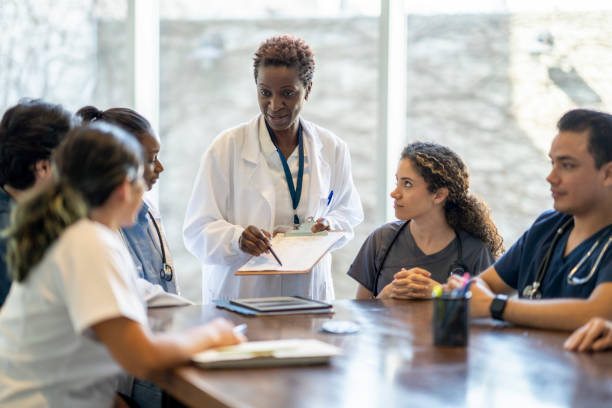 istock Female Doctor Teaching Nursing Students 1387152902