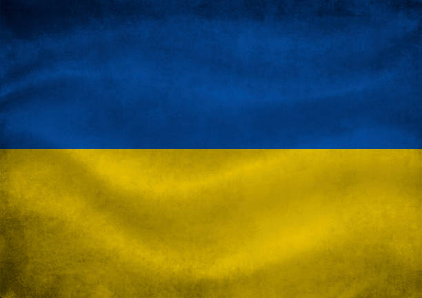 istock Ukrainian flag colours, abstract texture background. 1387154535