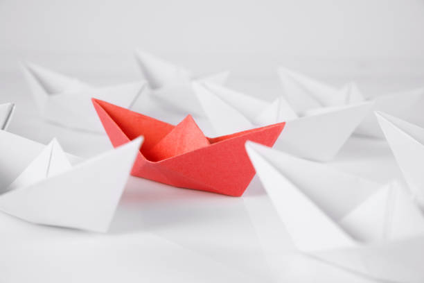 istock Red and White Paper Boats 1387155623