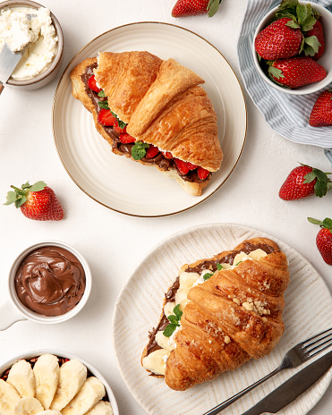 French breakfast croissant with fruits. Flat lay