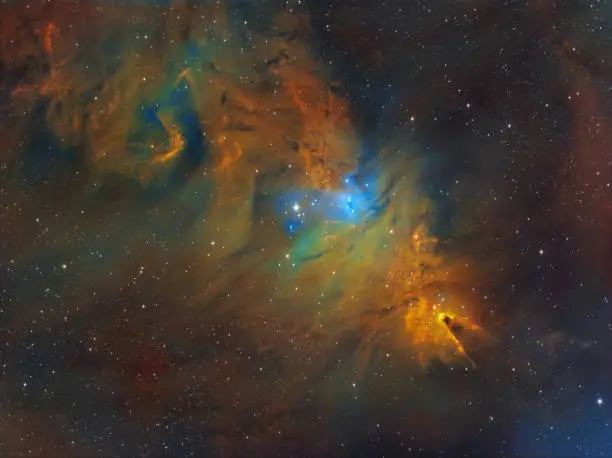The Cone Nebula and the Christmas Tree Cluster (NGC 2264) is the large hydrogen and sulfur gas cloud in the constellation of Monoceros. Formation consists of young stars obscured by heavy layers of dust clouds. The nebula is 2,300 light years away from Earth. Amateur image consists of hydrogen, oxygene and sulfur signal, total exposure time: 31h15m, HST palette image.