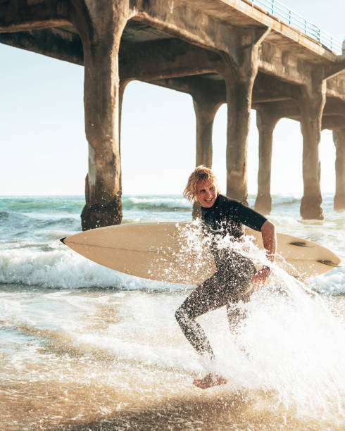 happiness surfer with the surfboard