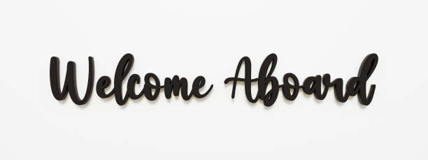 istock Welcome aboard. Banner with dark letters against white  background. 1387167256