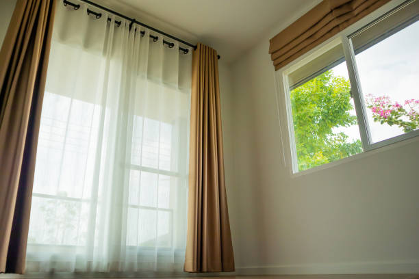 istock Curtain window interior decoration in living room 1387172325