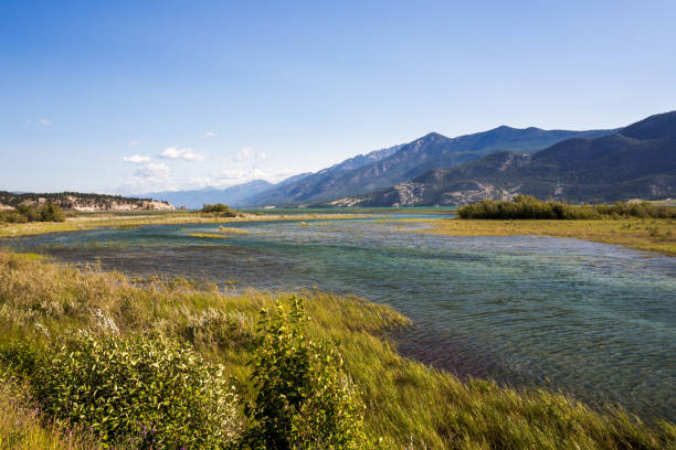 istock River landscape with mountains on the background 1387174980