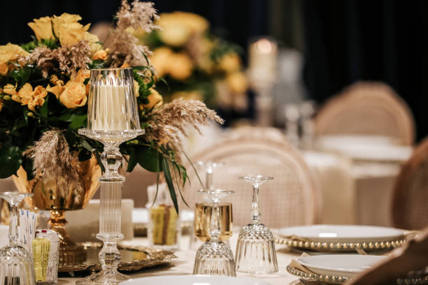 istock Wedding Guest Table Decorated With Flowers 1387177091