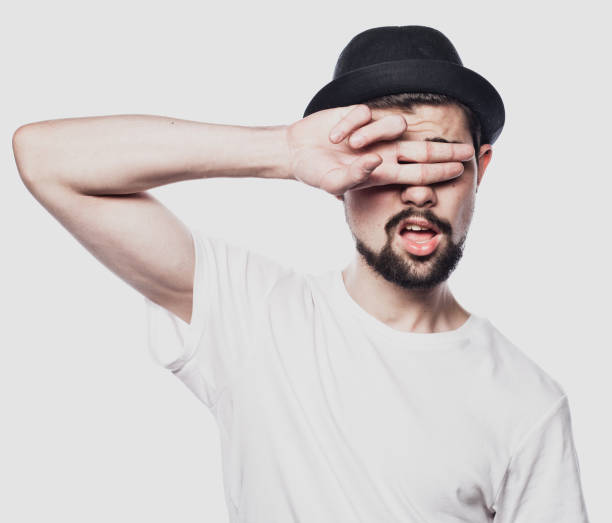istock Portrait of cheerful smiling bearded man 1387181014