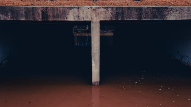 istock Heavy rain melted snow as drains fill up 1387183451