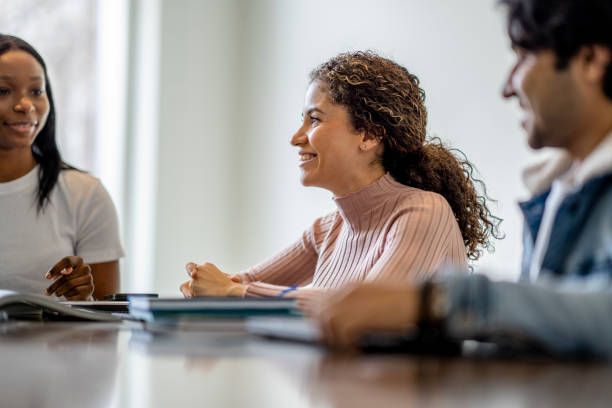 istock Female University Student Studying with Peers 1387183630