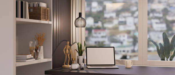 istock Modern luxury home working space with portable laptop mockup and decor 1387188525