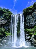 istock Jeju waterfall 1387189625