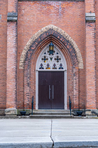 istock Old church door and beautiful brick design 1387191515