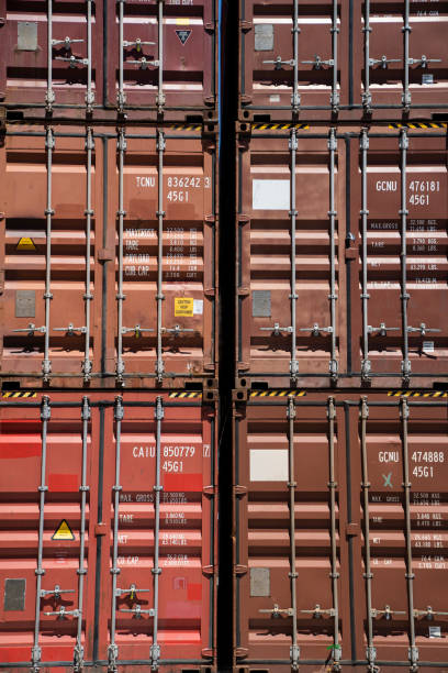 istock Stacks of red containers during daytime 1387193015