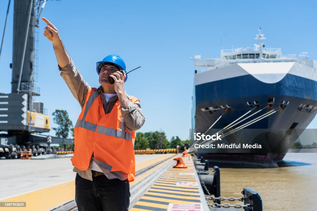 Handker Use Male Cargo Handler Using Walkie Talkie While Giving Instructions Stock ...