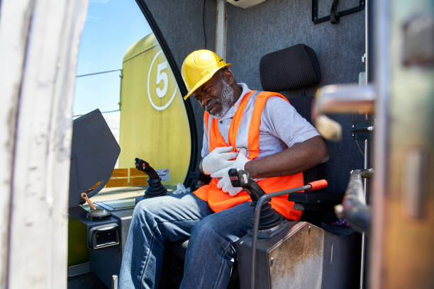 istock African american male cargo handler feeling sick while holding stomach with hands 1387194177