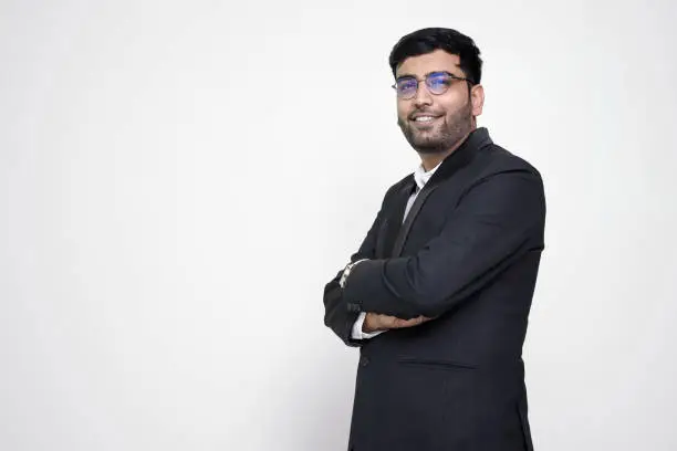 Portrait of confident businessman on the white isolated background.