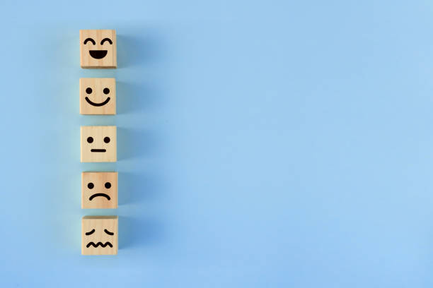 istock Building blocks with five levels of expressions painted on them. 1387202728