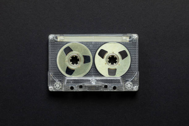 istock Vintage audio cassette on black background 1387203880