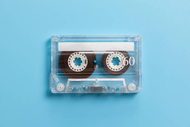 istock Vintage audio cassette on blue background 1387203893