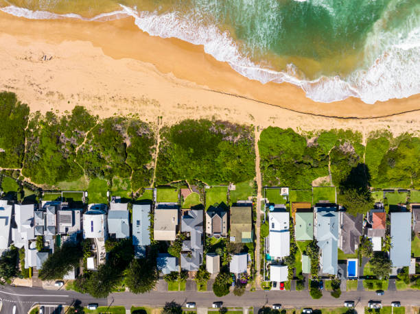 istock Coastal Suburb overhead perspective roof tops 1387204481