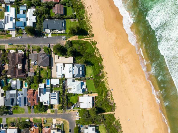 istock Coastal Suburb overhead perspective roof tops 1387204621